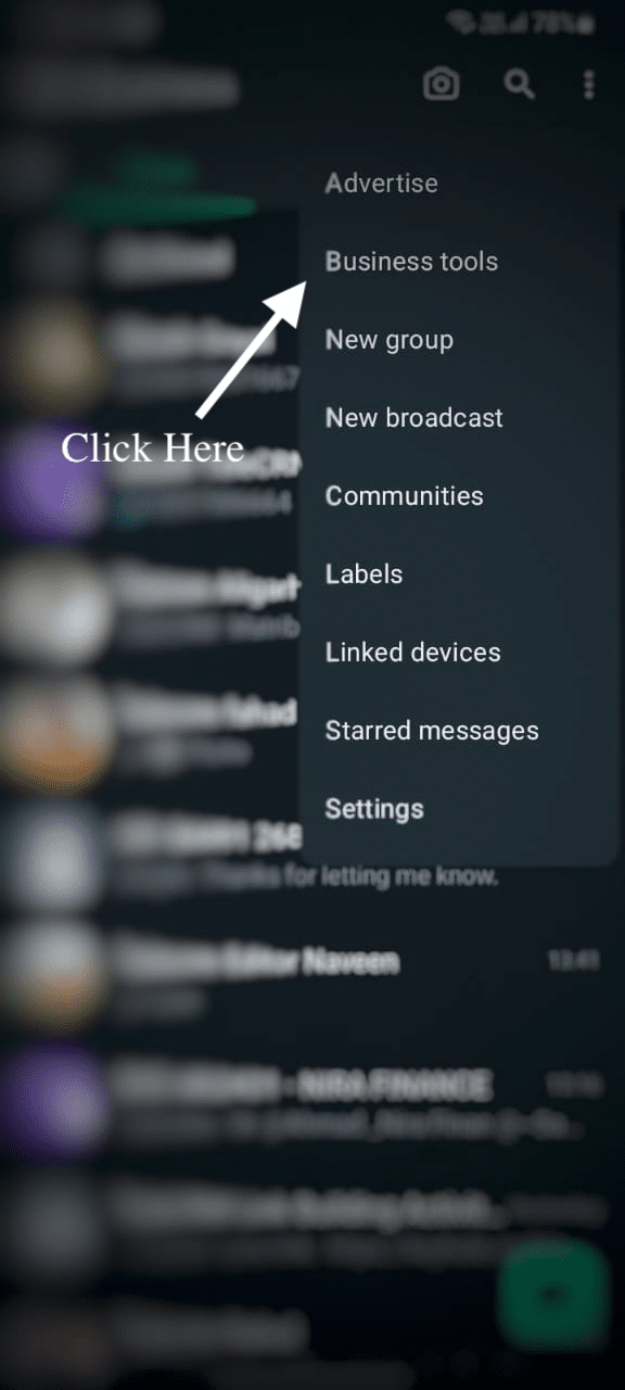 Open the WhatsApp Business app, tap the three dots in the top right corner and then select 'Business tools' from the drop-down menu